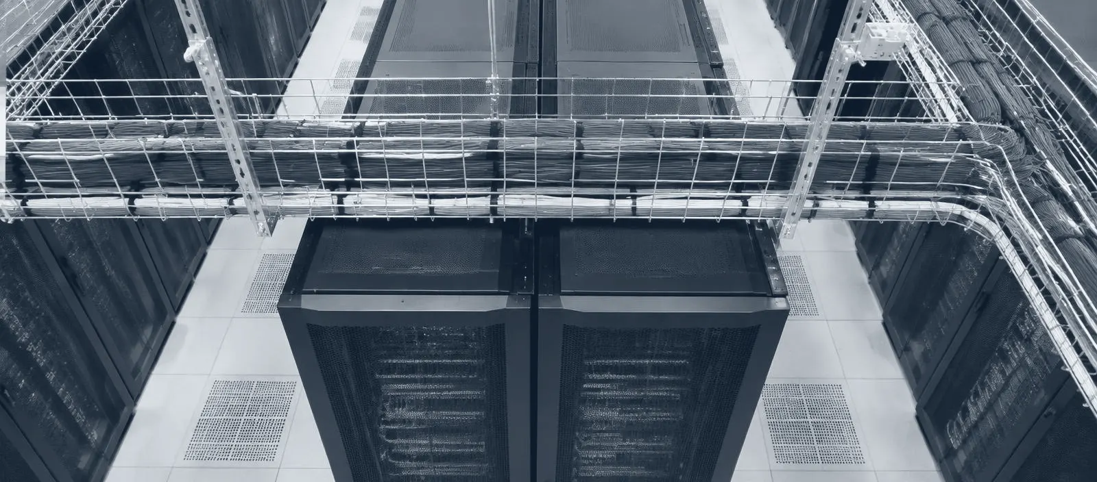 Cable trays above server racks, seen from above